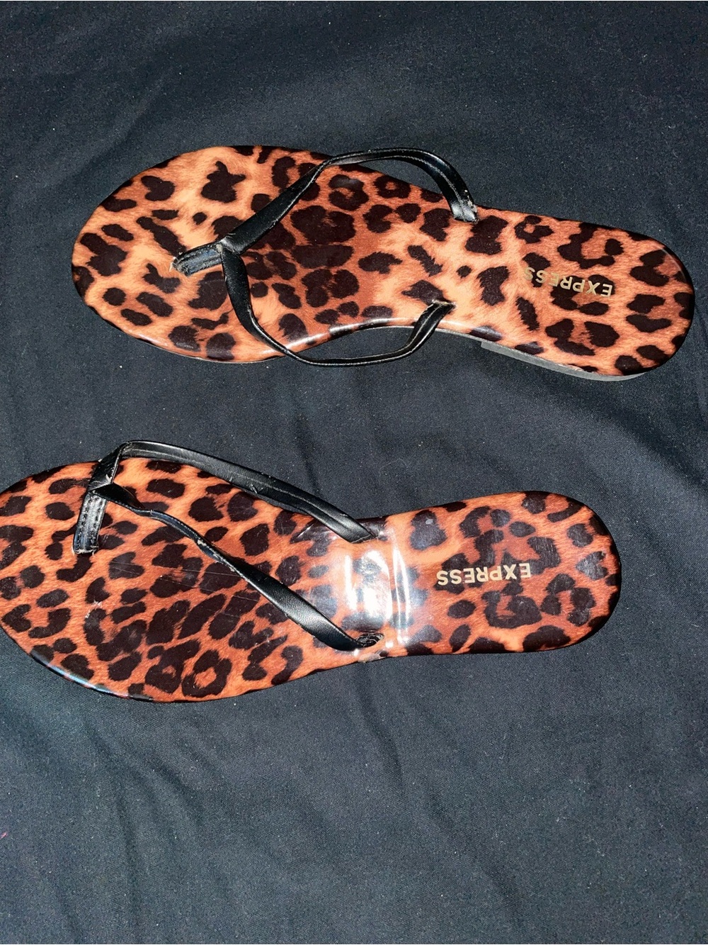 Express Leopard Print Flip Flops with Black Straps Size 6
